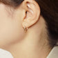 10K Faceted Hoop Earrings (Rose Gold) - Model Image