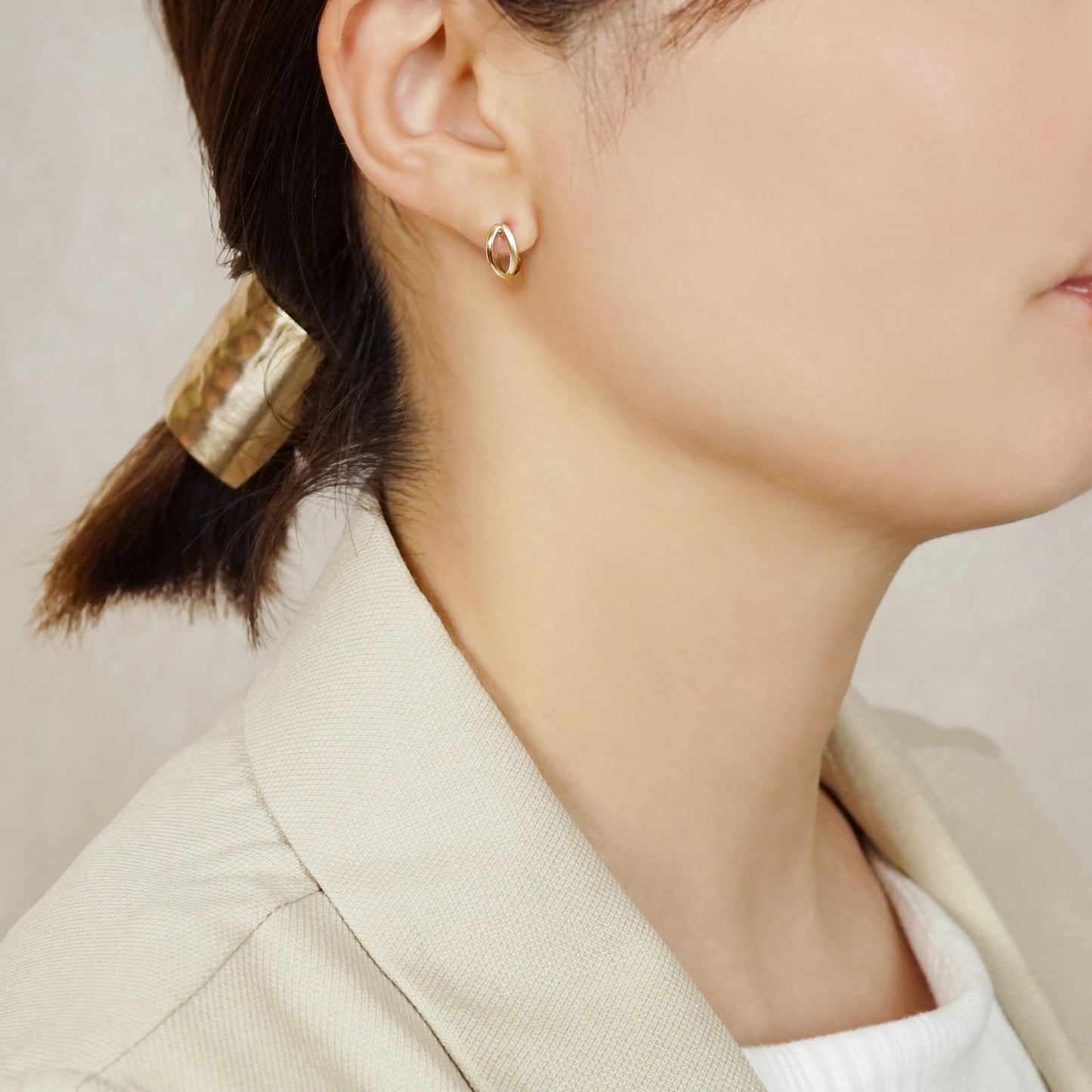 10K Crossover Hoop Earrings XS (Yellow Gold) - Model Image