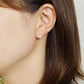 10K 9-Stone Square Stud Earrings (Yellow Gold) - Model Image