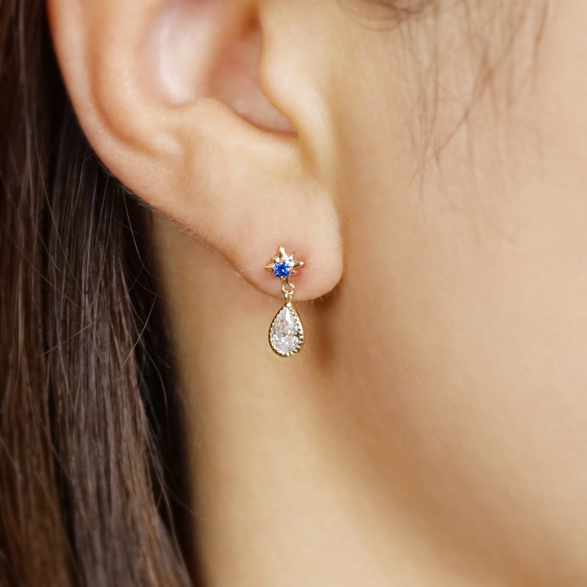 10K Star Swinging Dew Drop Earrings (Yellow Gold) - Model Image