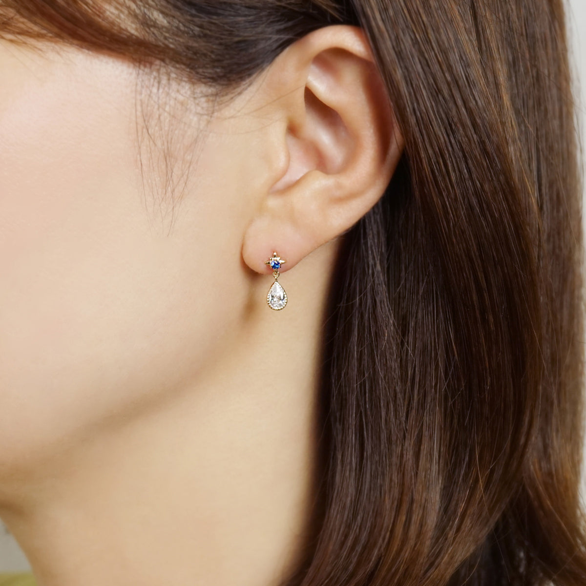 10K Star Swinging Dew Drop Earrings (Yellow Gold) - Model Image