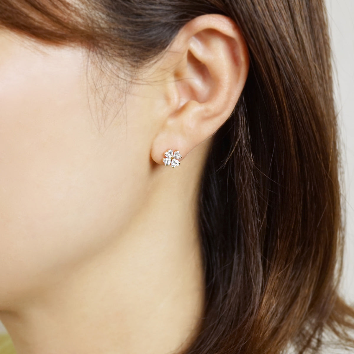 10K Four Leaf Clover Stud Earrings (Yellow Gold) - Model Image