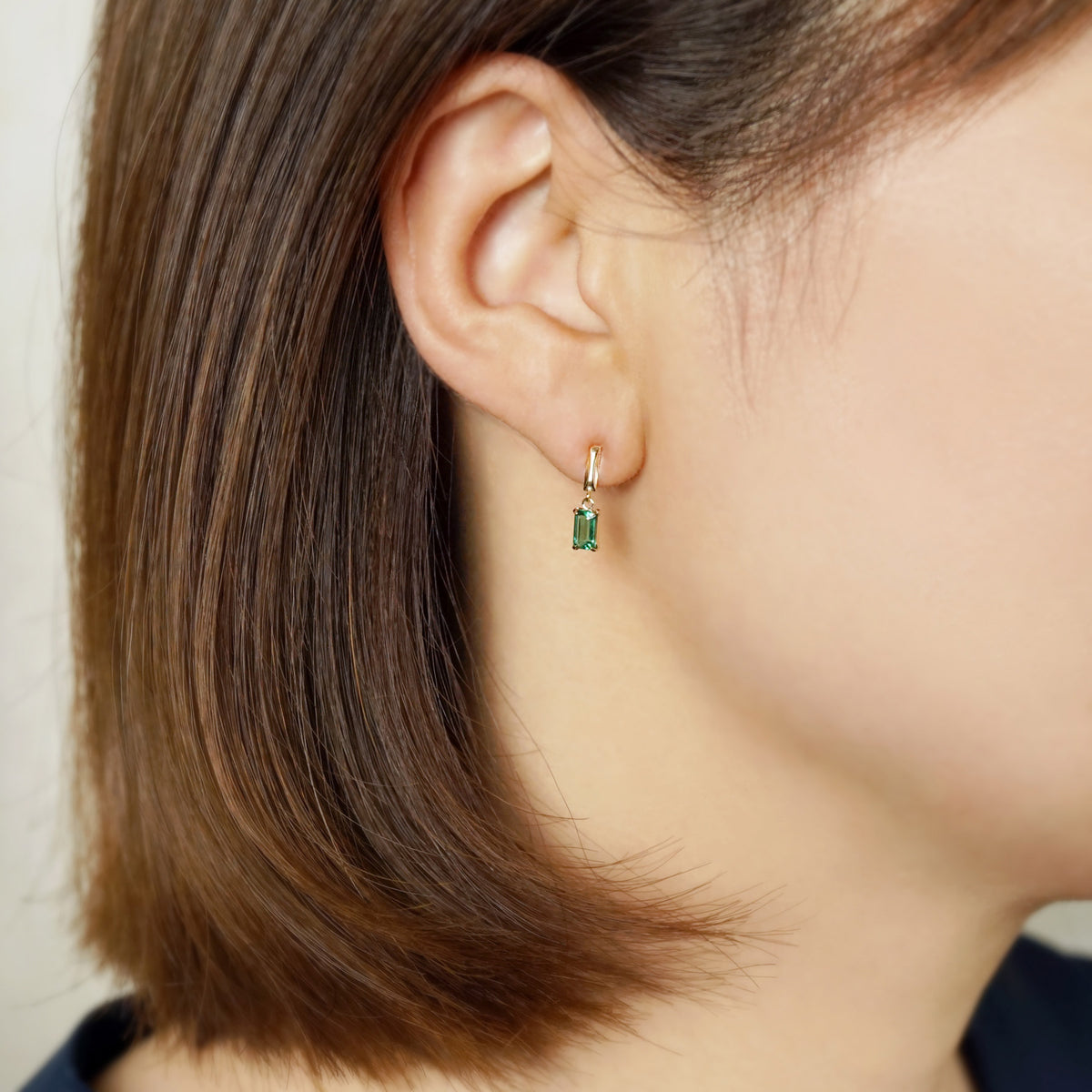 10K Green Quartz Baguette Cut Swinging Earrings (Yellow Gold) - Model Image