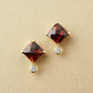 10K Garnet Checkerboard Cut Stud Earrings (Yellow Gold) - Product Image