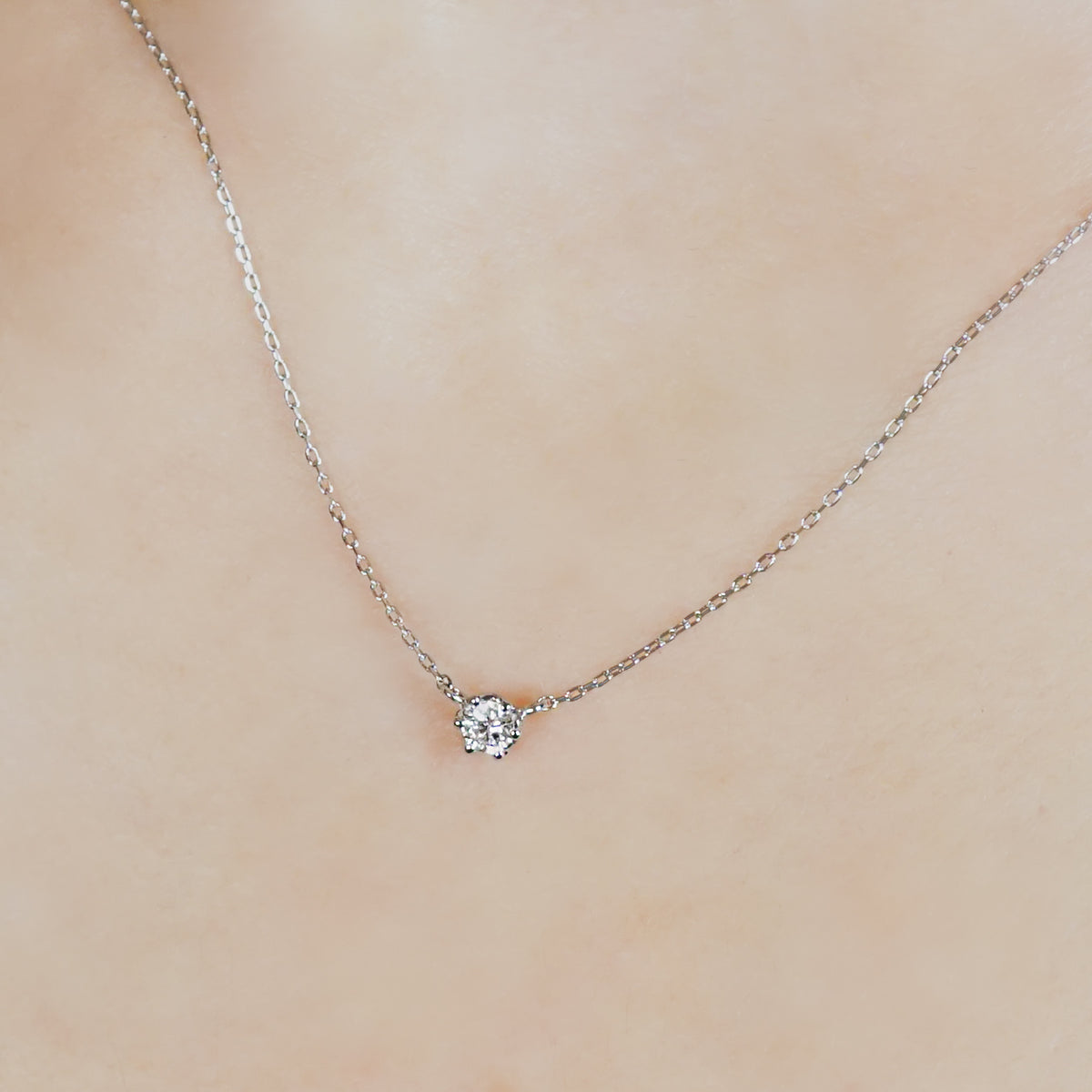 Platinum Heart & Cupid Diamond Solitaire Necklace - Model Image