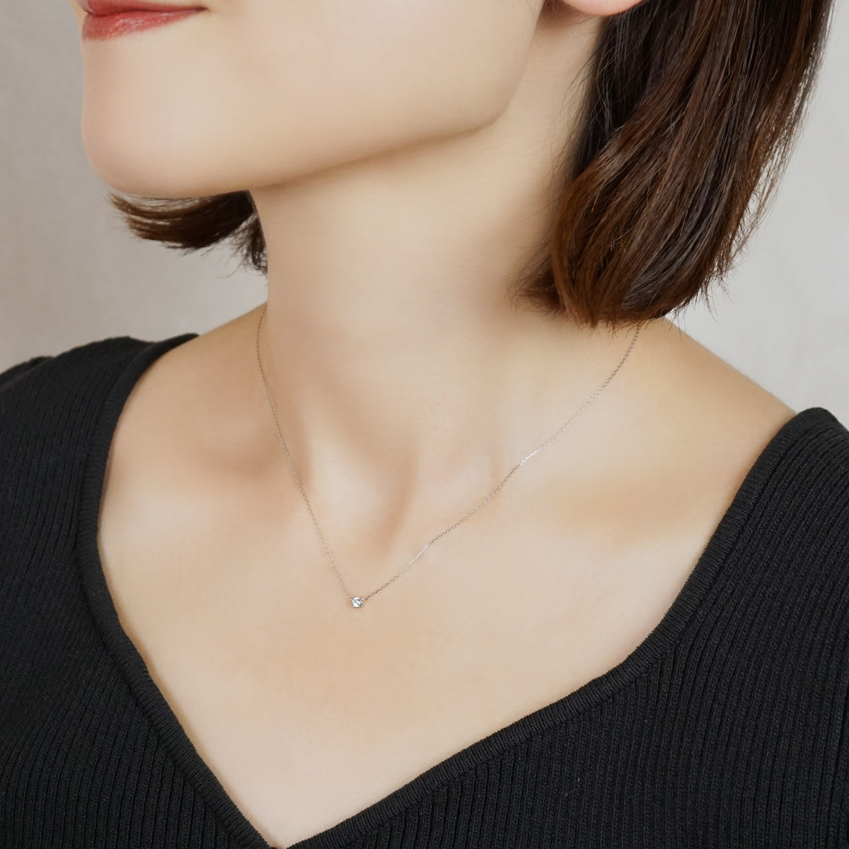 Platinum Heart & Cupid Diamond Solitaire Necklace - Model Image