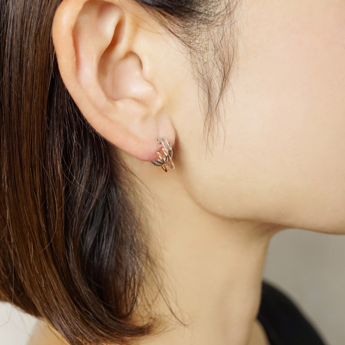 10K Double Hoop Earrings (White Gold / Rose Gold) - Model Image