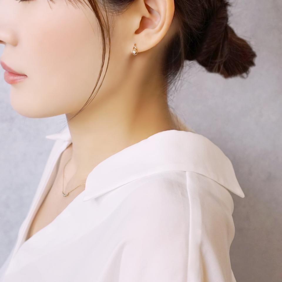 18K/10K Yellow Gold Opal Stud Earrings - Model Image