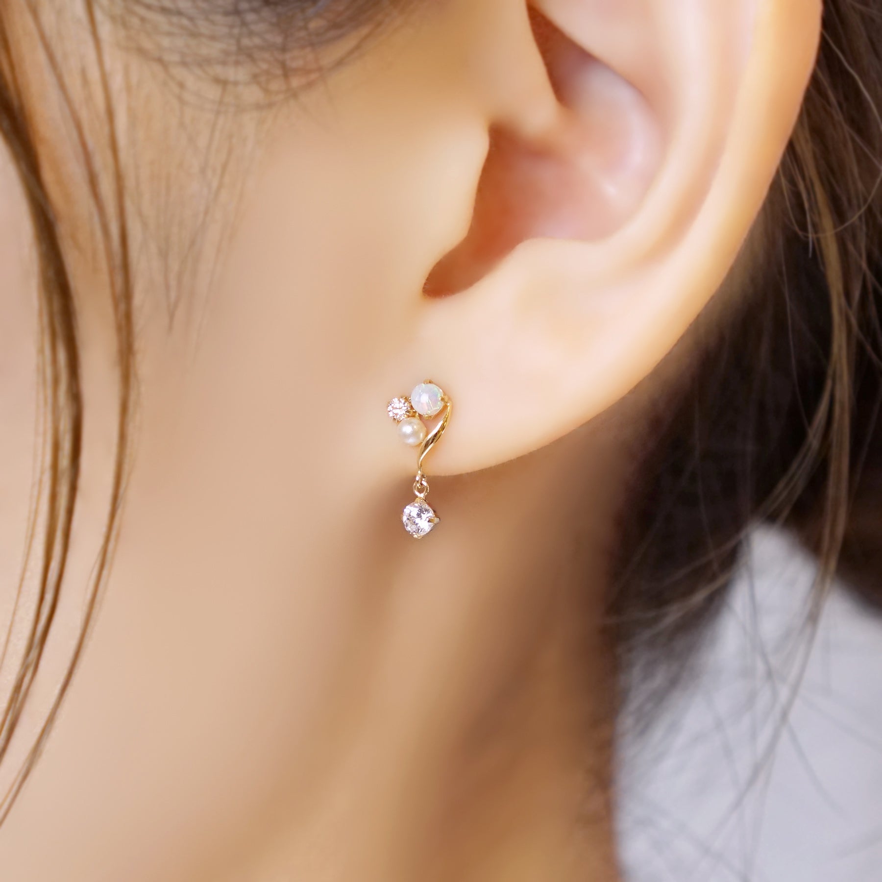 18K/10K Yellow Gold Swaying Opal Earrings - Model Image