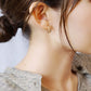 14K/10K Yellow Gold Texture Mixed Hoop Earrings (Medium) - Model Image