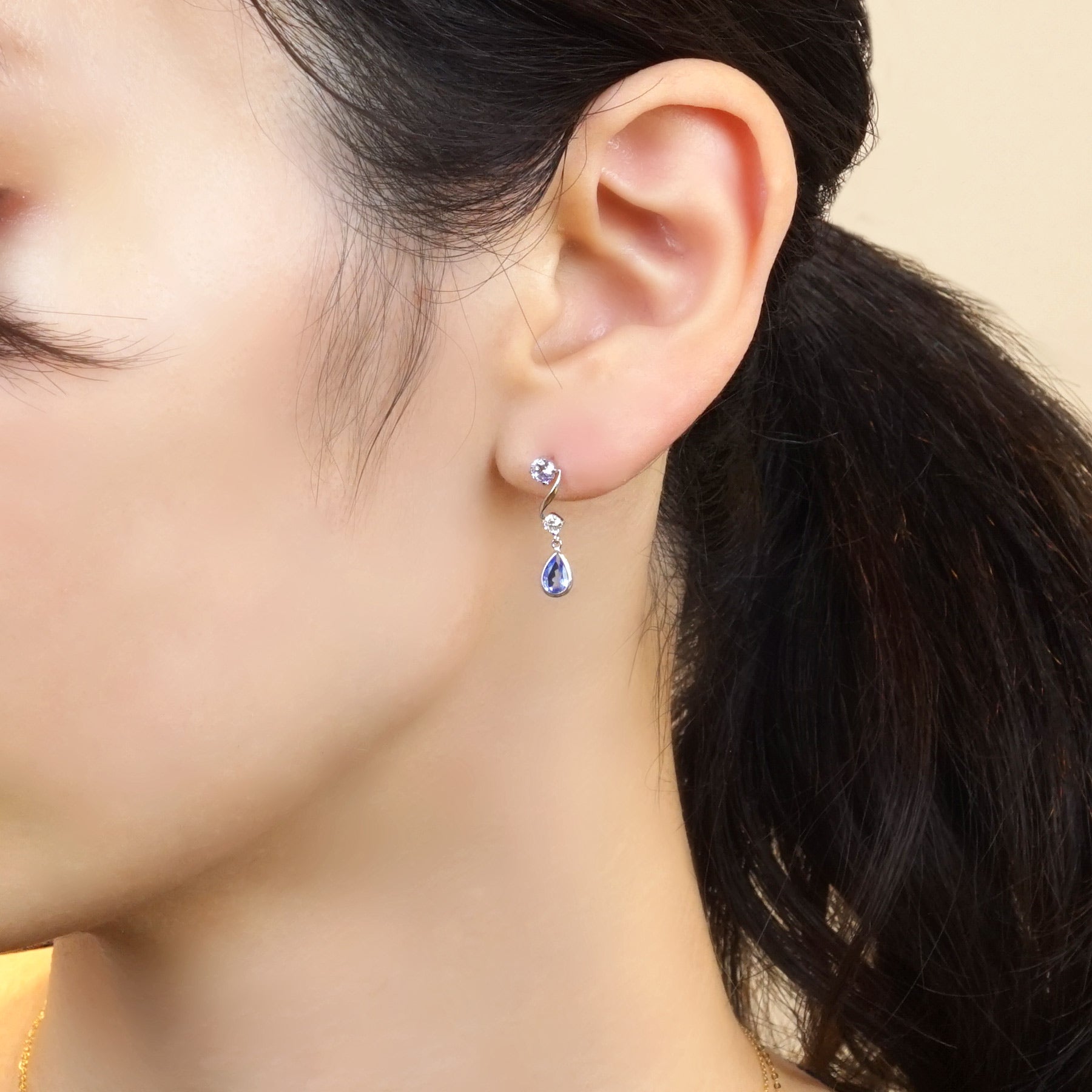 14K/10K White Gold Blue Quartz Swinging Earrings - Model Image