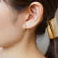 18K/10K Yellow Gold Wave Hoop Earrings - Model Image