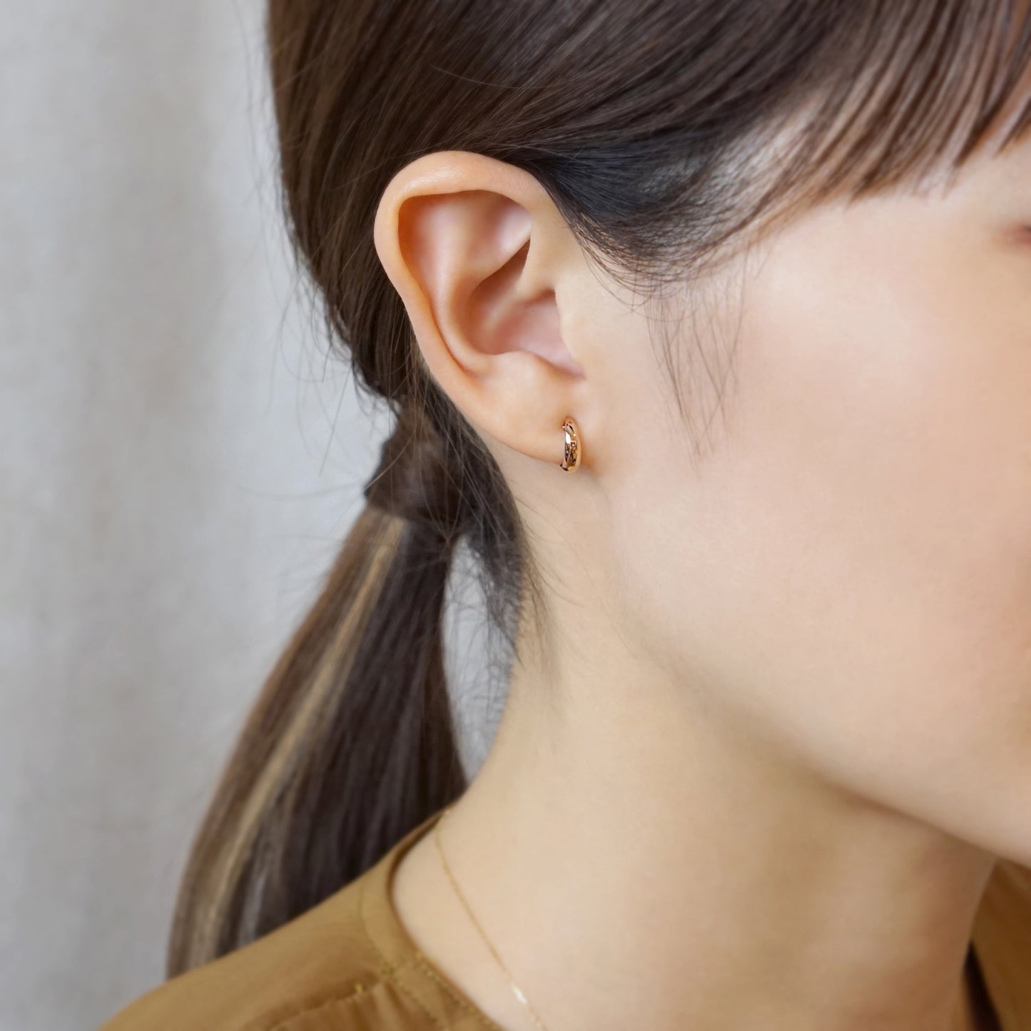 18K/10K Rose Gold Moon Design Hoop Mini Earrings - Model Image