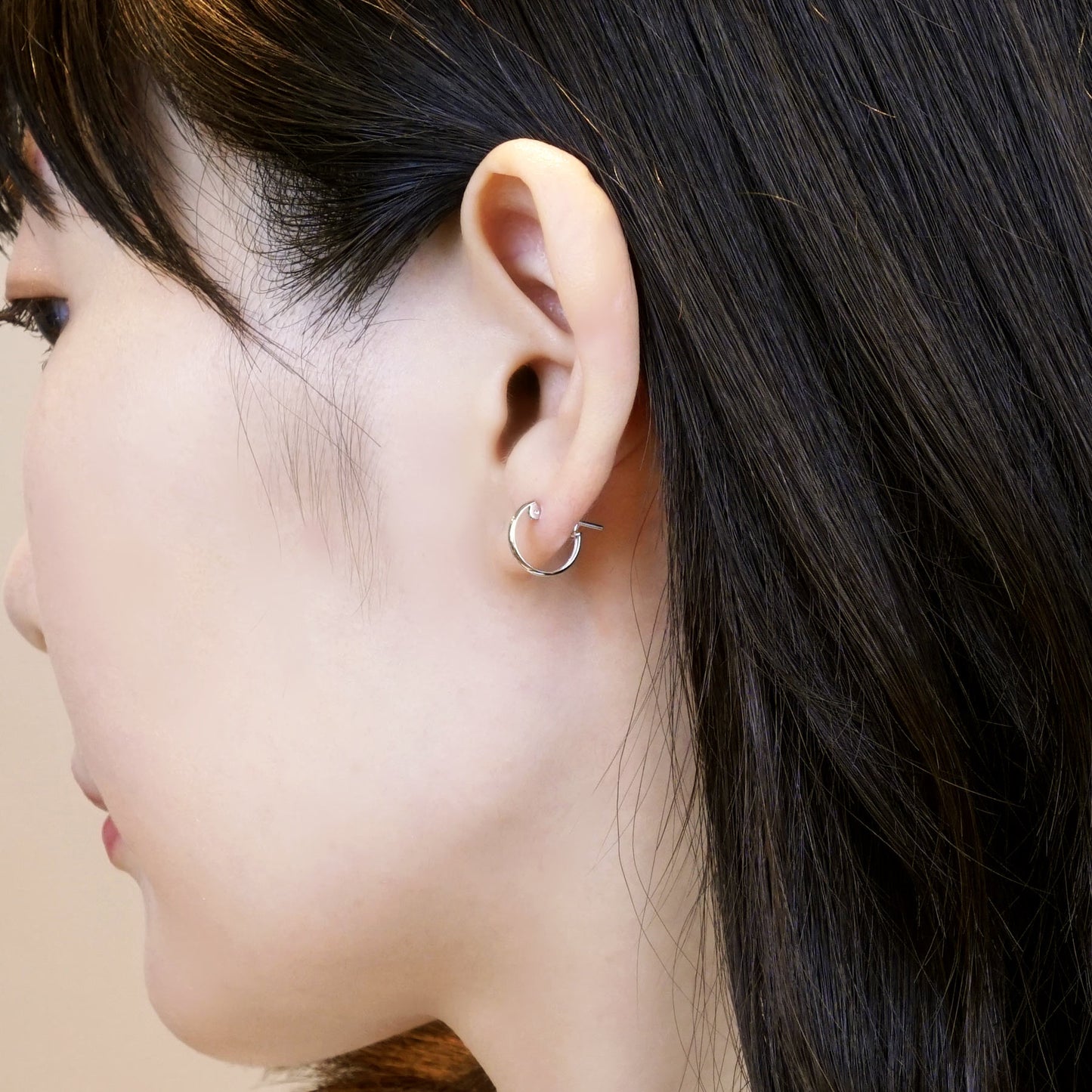 14K/10K White Gold Mini Hoop Earrings - Model Image