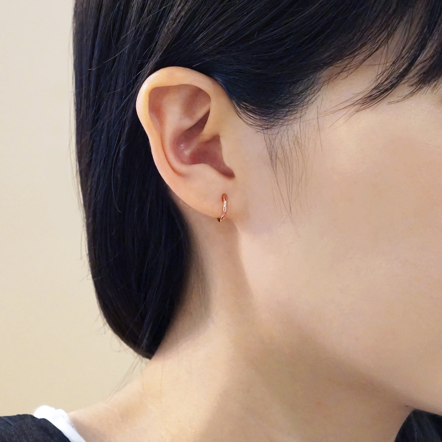 18K/10K Rose Gold Mini Hoop Earrings - Model Image
