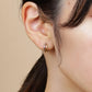 14K/10K Gold Cross Hoop Earrings (Small) (White Gold / Yellow Gold) - Model Image