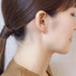 18K/10K Rose Gold Cross Hoop Earrings (Small) - Model Image