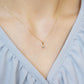 10K Moonstone x London Blue Topaz Necklace "Flutter" (Yellow Gold) - Model Image