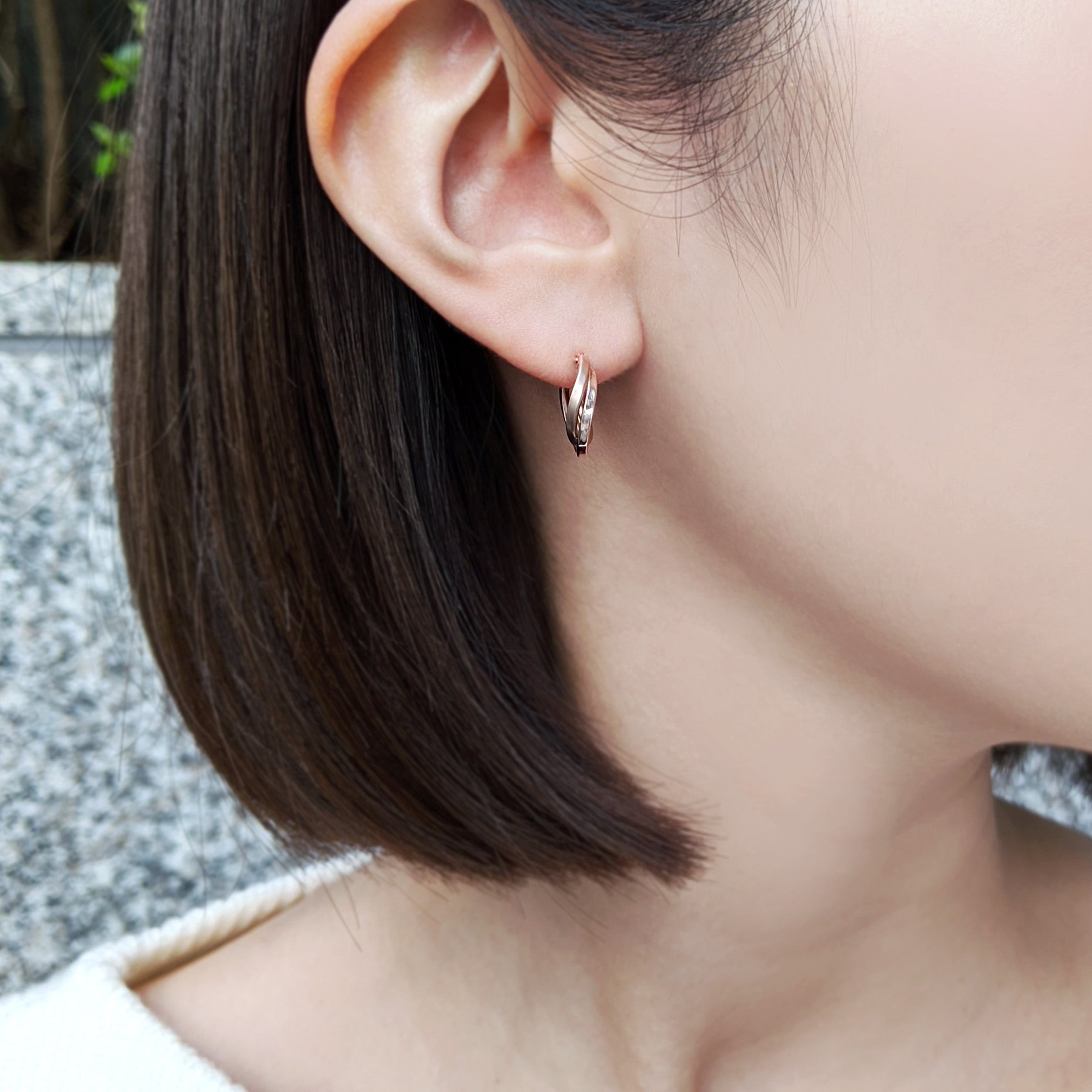18K/10K Rose Gold Twisted Twin Hoop Earrings - Model Image