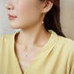 10K Yellow Gold Tanzanite Full Bloom Birthstone Necklace - Model Image