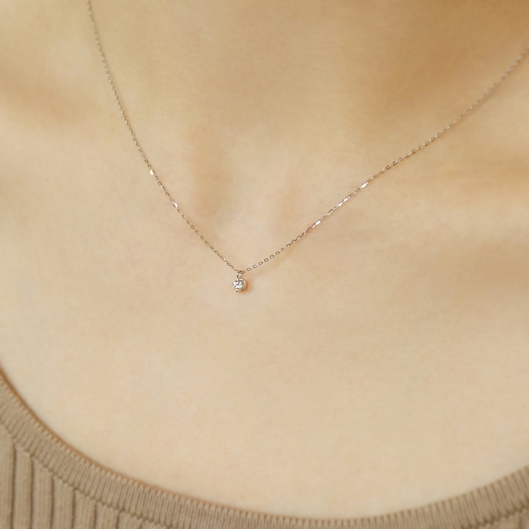 10K White Gold Diamond Solitaire Necklace - Model Image