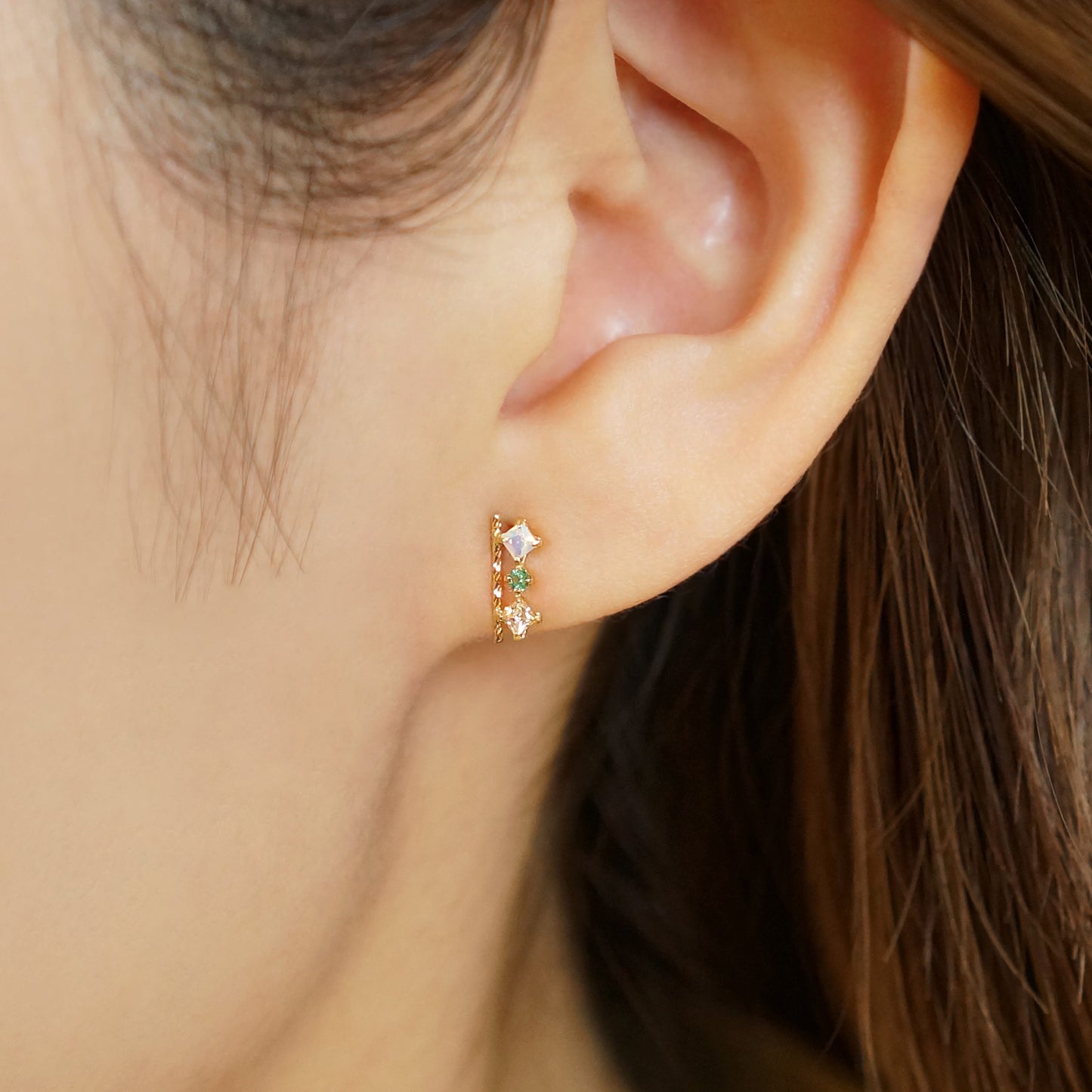 18K/10K Yellow Gold Emerald 3-Stone Bar Earrings - Model Image