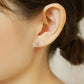 18K/10K Yellow Gold Blue Zircon Stud Earrings - Model Image