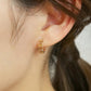 18K/10K Yellow Gold Flower Punching Hoop Earrings - Model Image