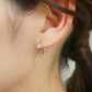 14K/10K White Gold Cut Pipe Hoop Earrings - Model Image