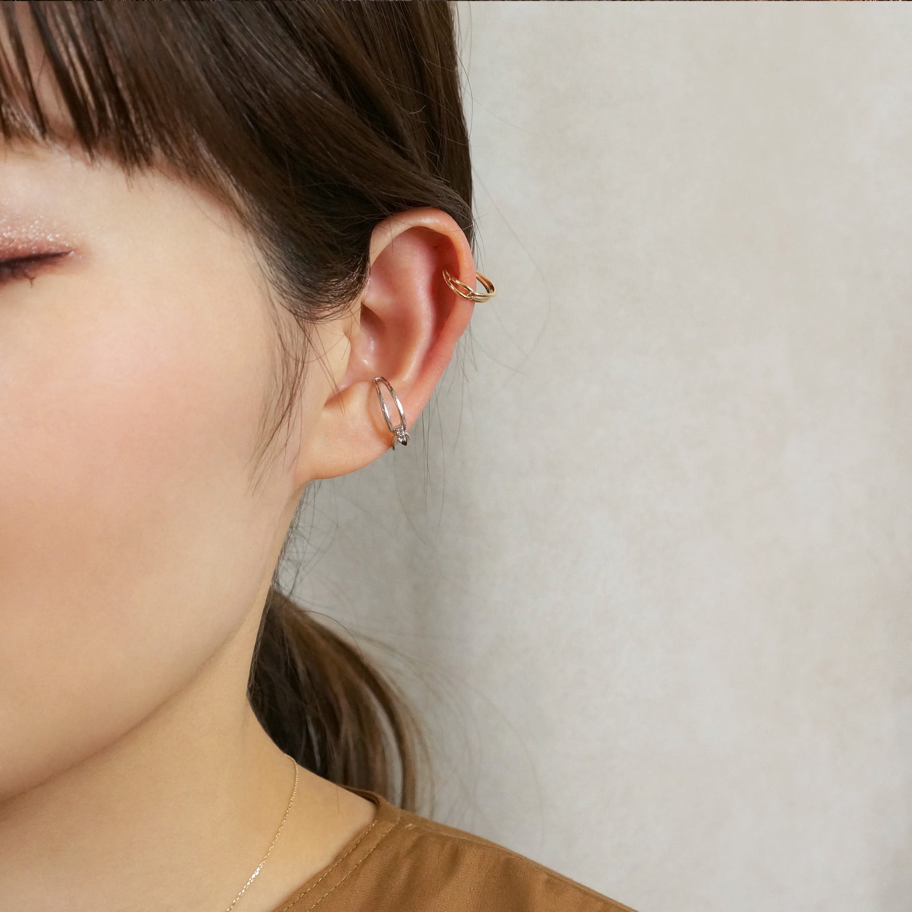 10K Gold / 925 Sterling Silver Infinity Ear Cuff Set - Model Image