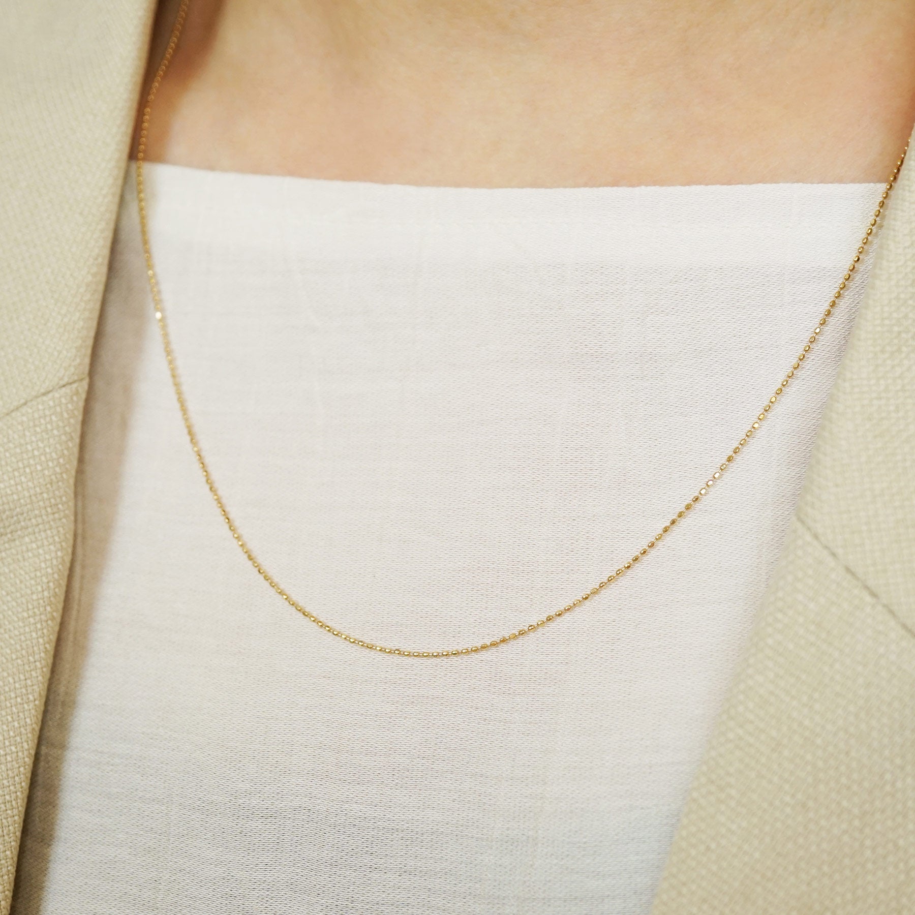 10K Cut Ball Chain Necklace 50cm (Yellow Gold) - Model Image