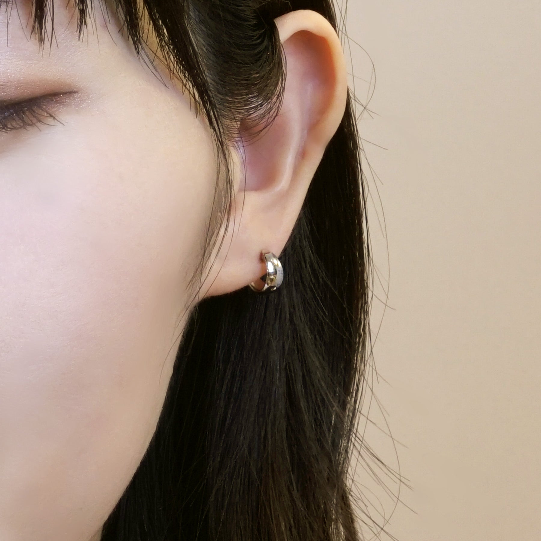 14K/10K White Gold Chunky Mini Hoop Earrings - Model Image