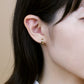 18K/10K Yellow Gold Chunky Mini Hoop Earrings - Model Image