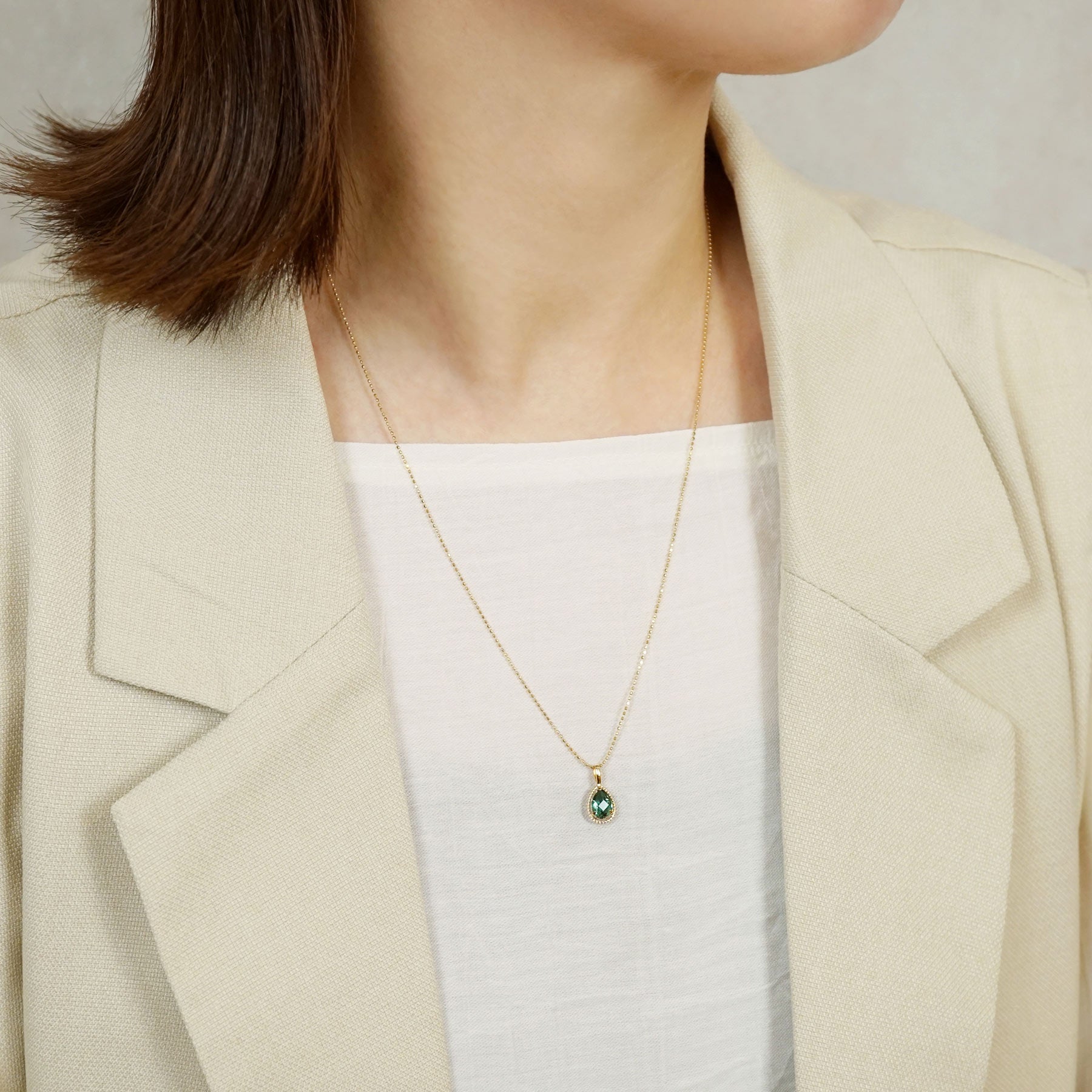 10K Green Quartz Drop Necklace Charm (Yellow Gold) - Model Image