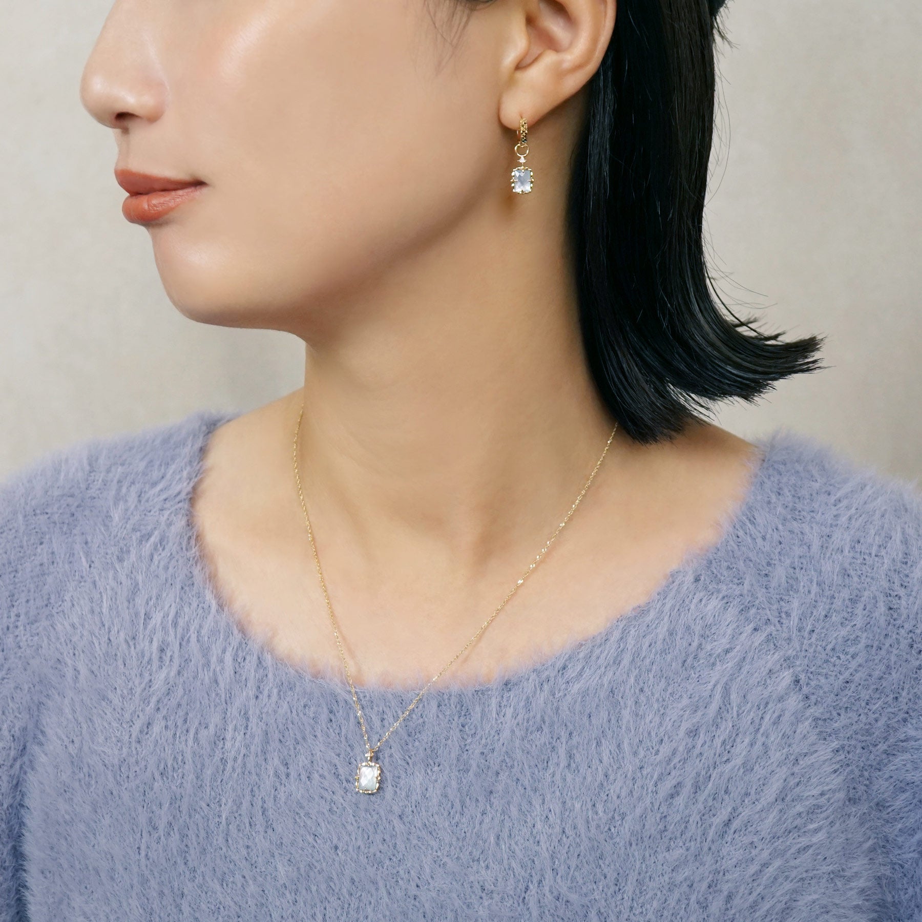 10K Blue Topaz "Crystal" Necklace (Yellow Gold) - Model Image