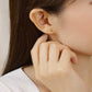 [Second Earrings] 18K Yellow Gold Egg Earrings - Model Image