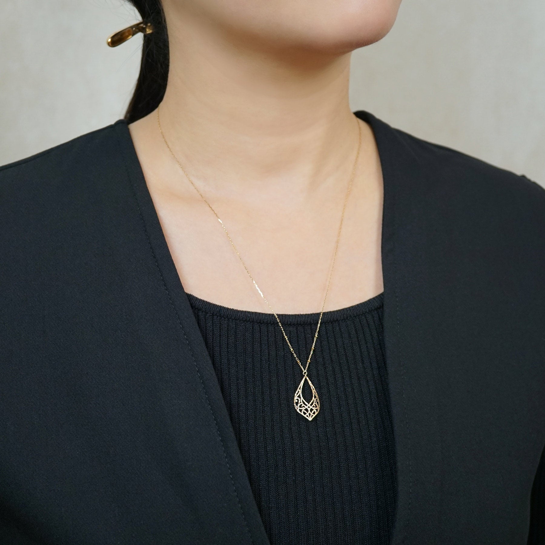 10K Open Work Leaf Design Necklace (Yellow Gold) - Model Image