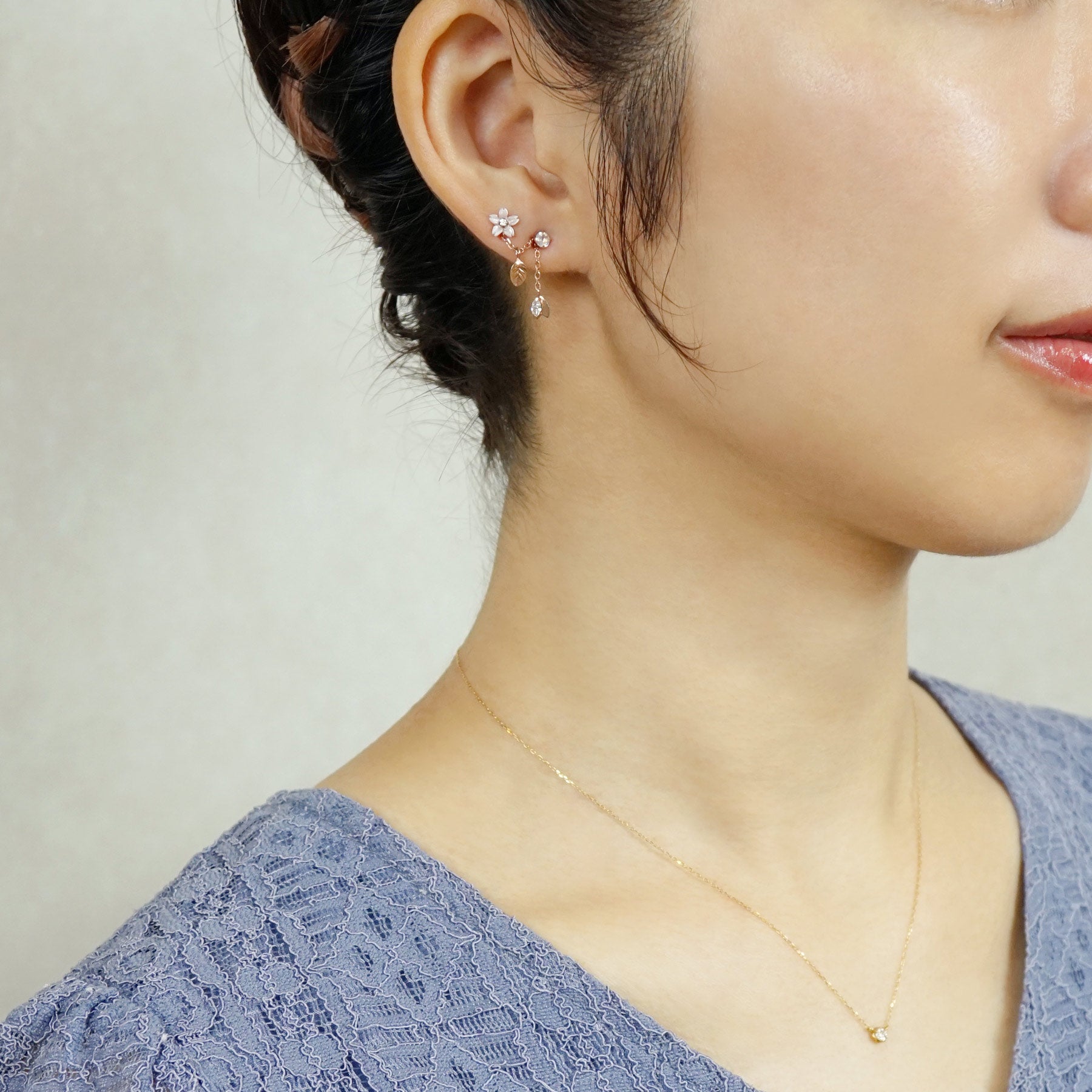 10K / 925 Sterling Silver Pink Shell Cherry Blossoms Double Piercing Chain Earrings - Model Image