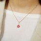 10K Inca Rose Necklace Charm (Yellow Gold) - Model Image