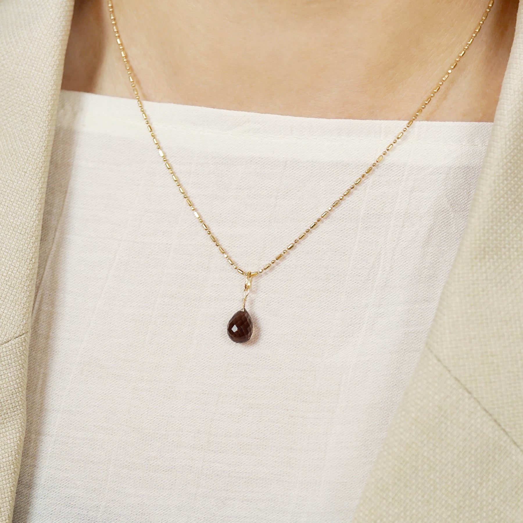10K Smoky Quartz Necklace Charm (Yellow Gold) - Model Image