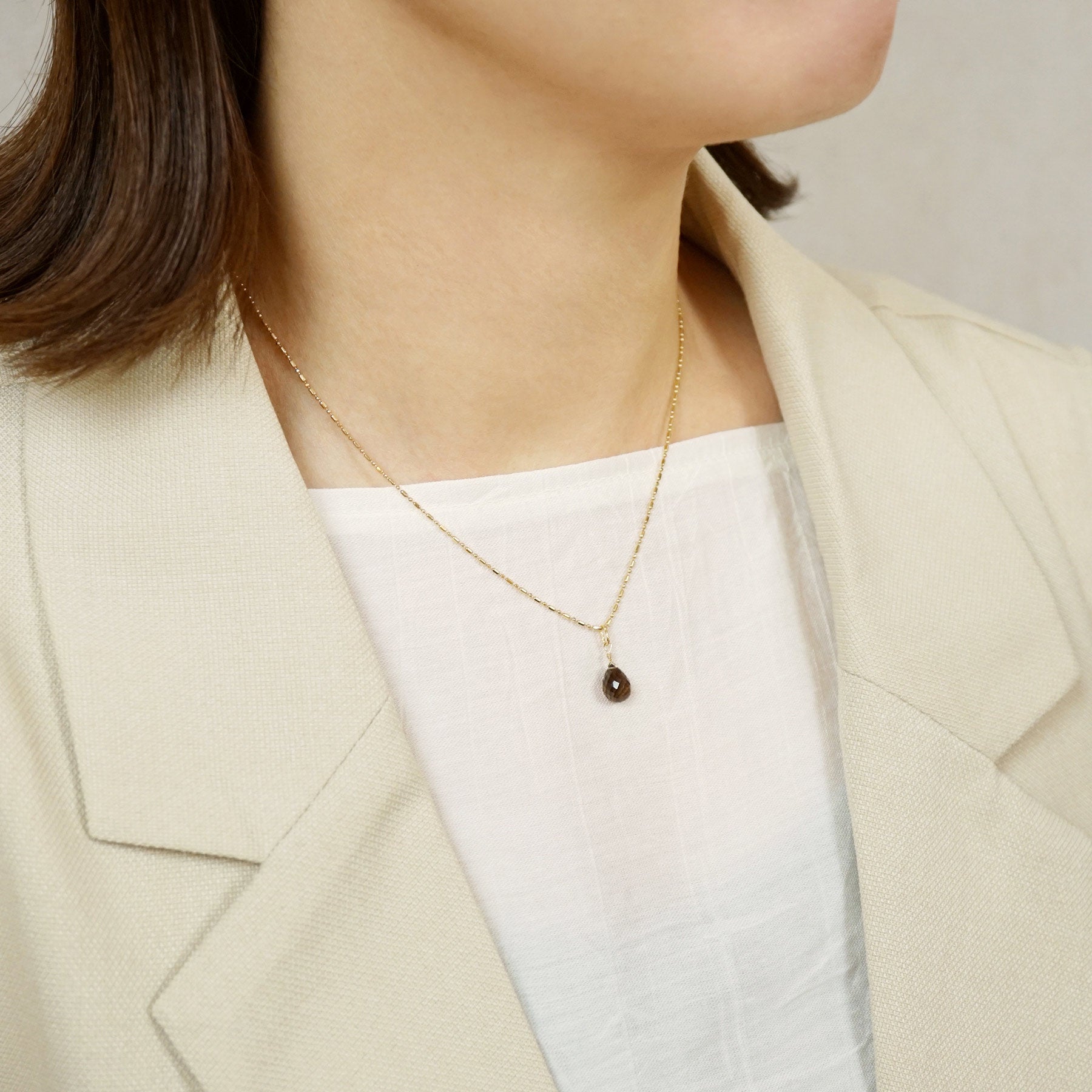 10K Smoky Quartz Necklace Charm (Yellow Gold) - Model Image
