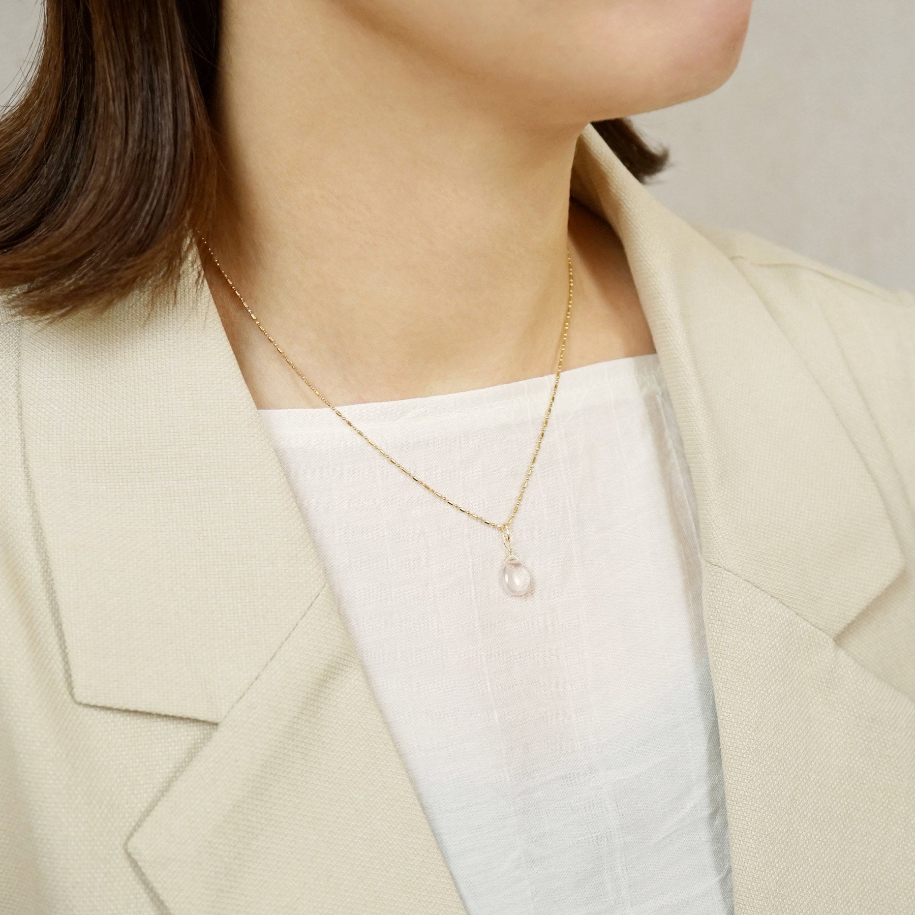 10K Rose Quartz Drop Necklace Charm (Yellow Gold) - Model Image