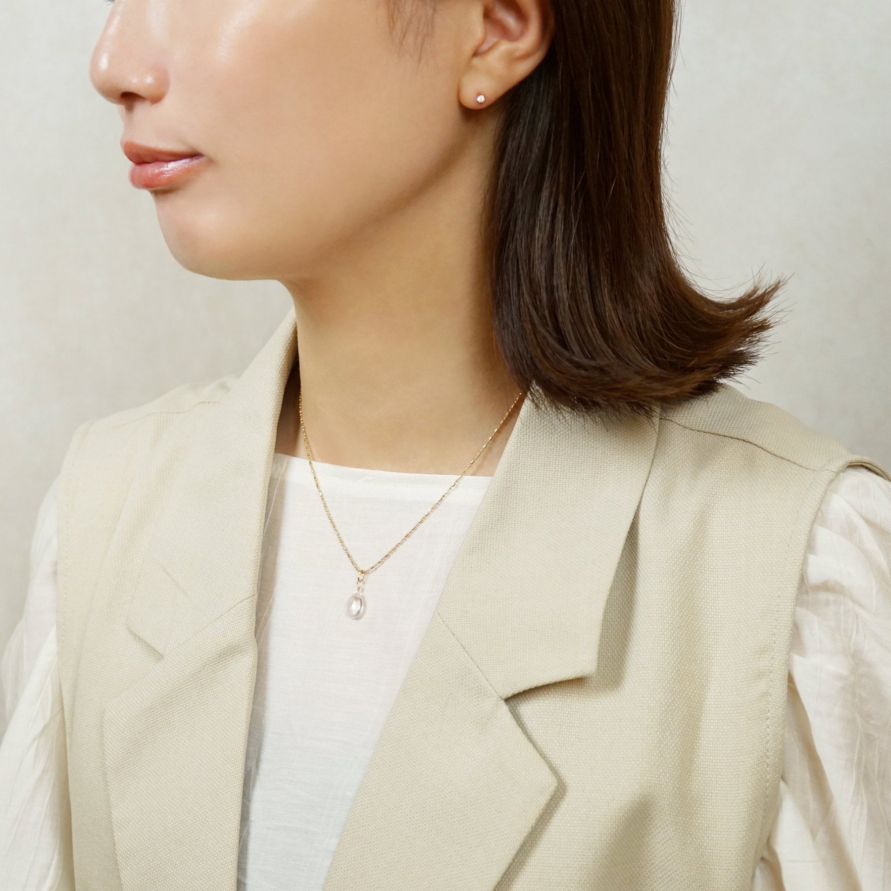 10K Rose Quartz Drop Necklace Charm (Yellow Gold) - Model Image