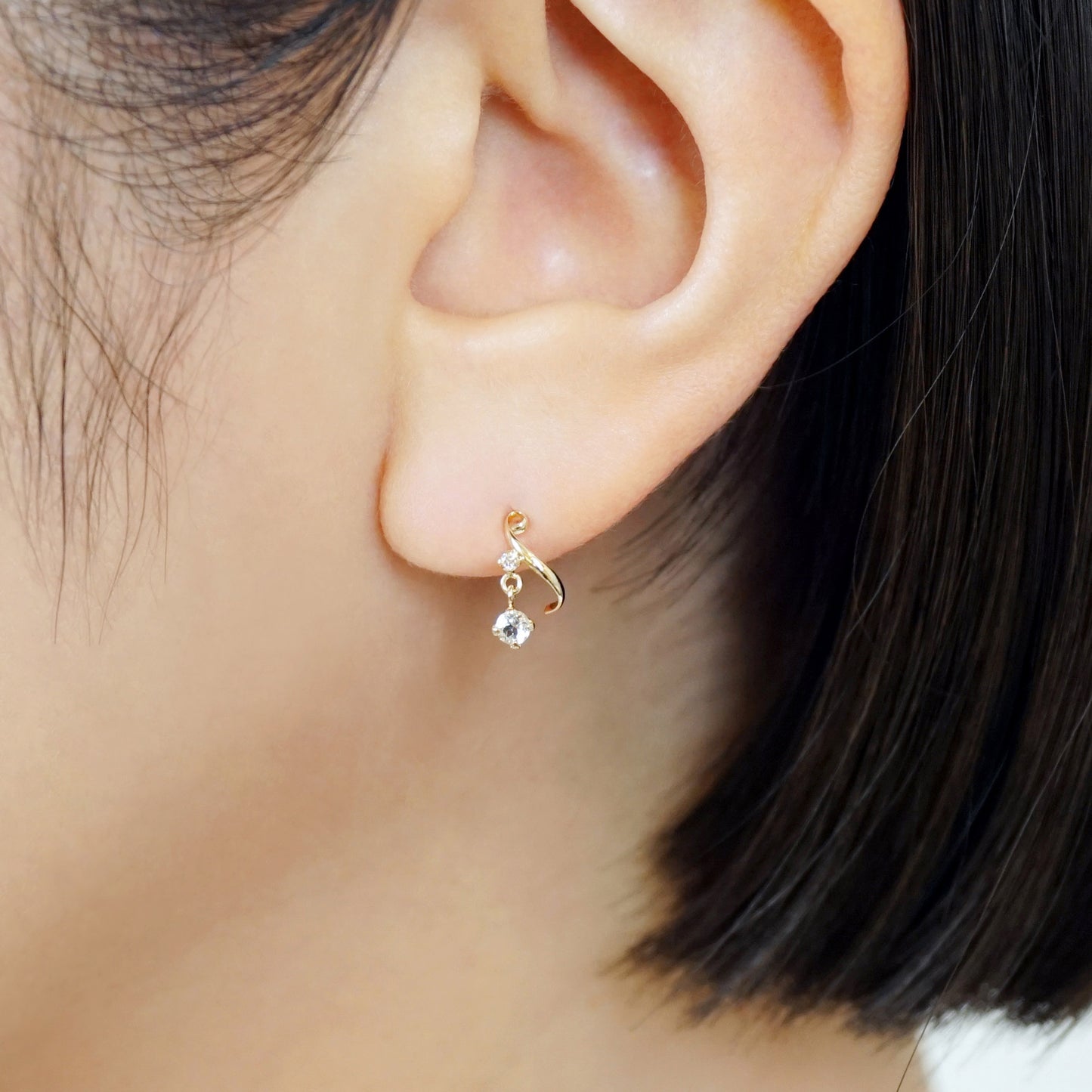 18K/10K Diamond Twisted Swinging Earrings (Yellow Gold) - Model Image