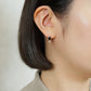 10K Black Color Baguette Swinging Earrings (Yellow Gold) - Model Image