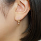 10K Champagne Color Baguette Swinging Earrings (Yellow Gold) - Model Image