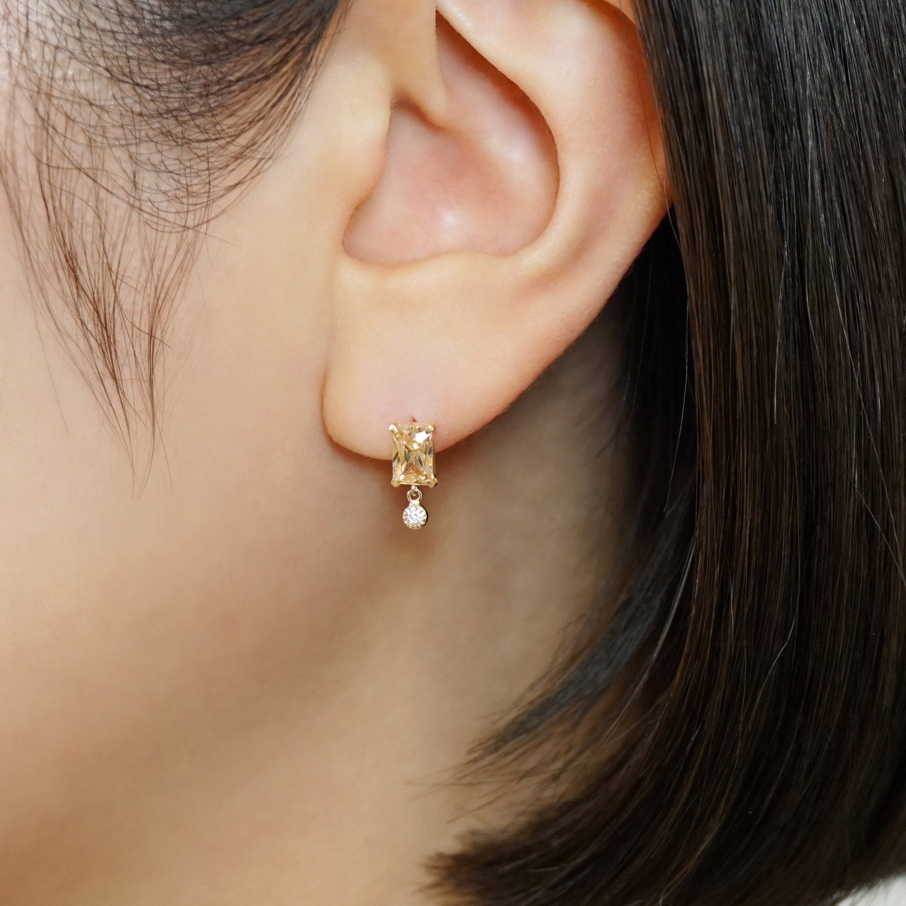 10K Champagne Color Baguette Swinging Earrings (Yellow Gold) - Model Image