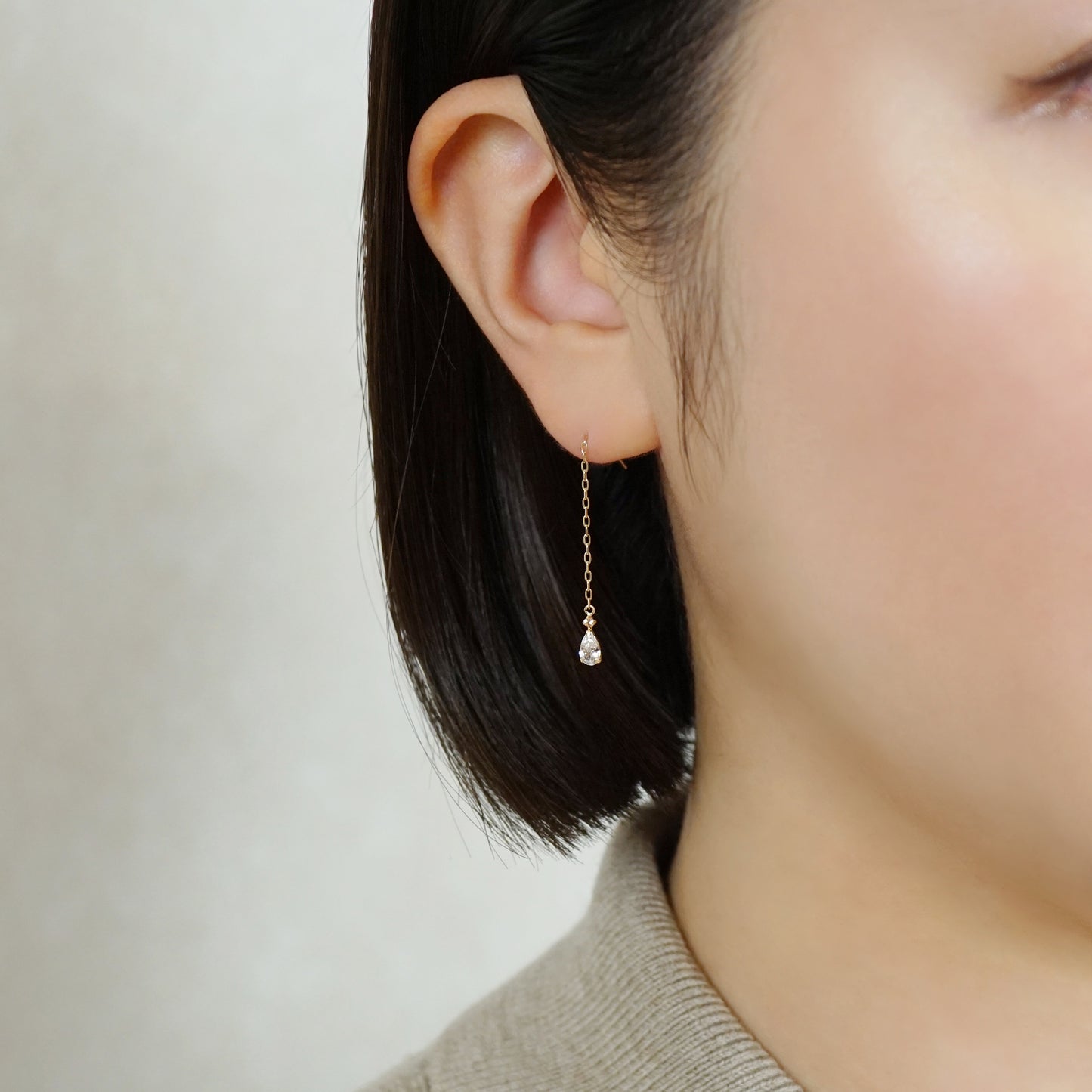 10K Drop Threader Earrings (Yellow Gold) - Model Image