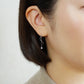 10K Glittering Twisted Dangle Earrings (White Gold) - Model Image