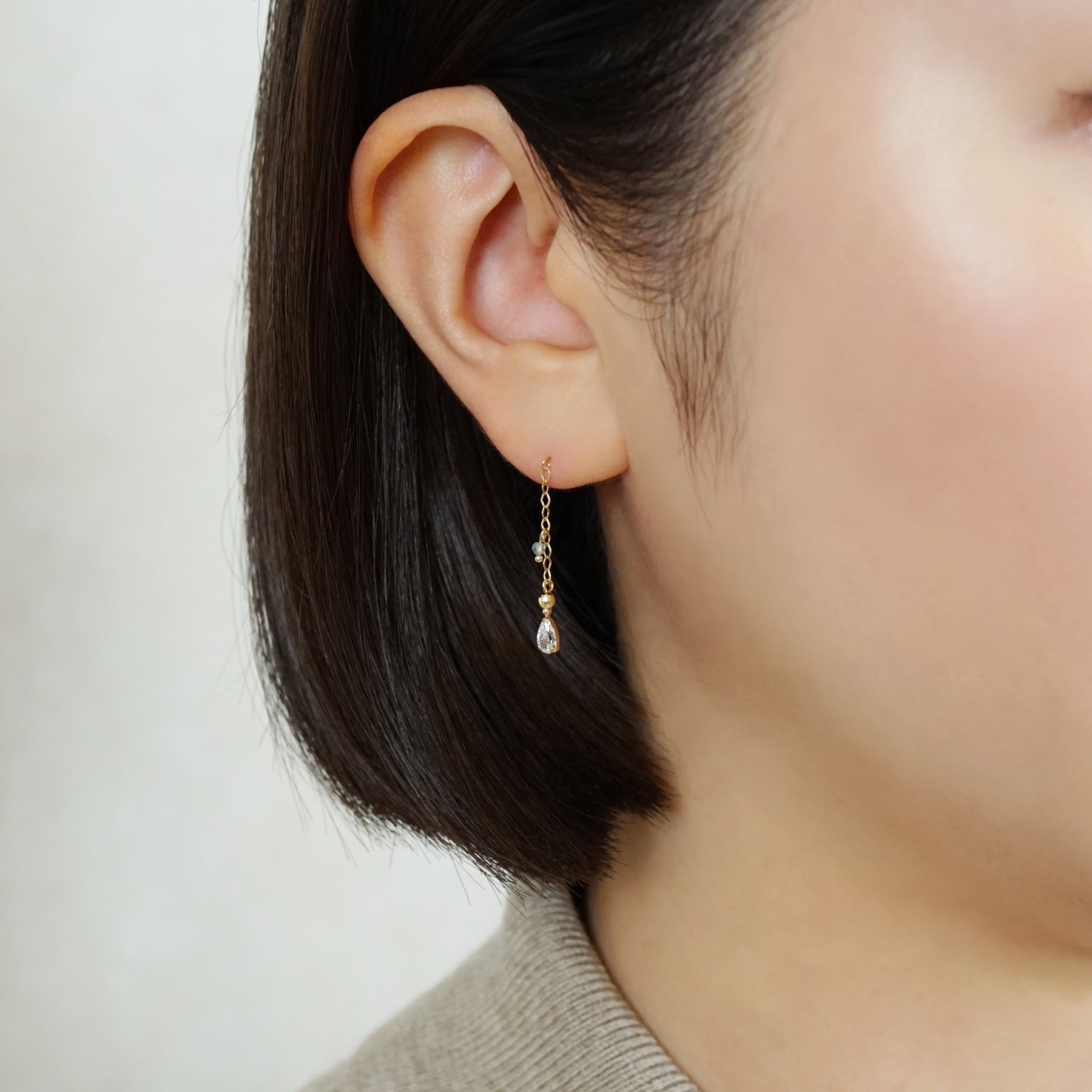 10K Glittering Drop Dangle Earrings (Yellow Gold) - Model Image